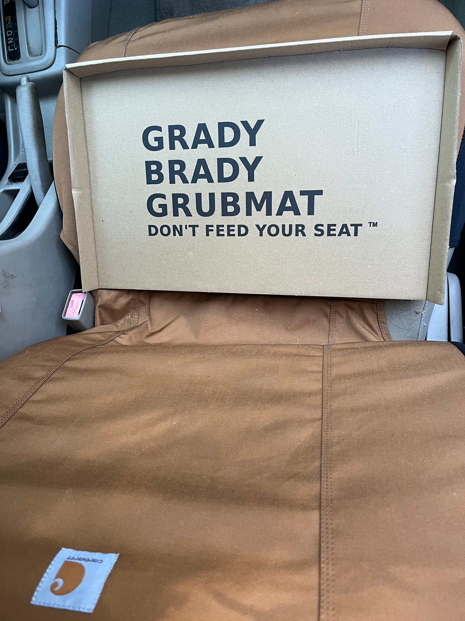 Grady Brady Grubmat disposable eating tray protecting a car seat